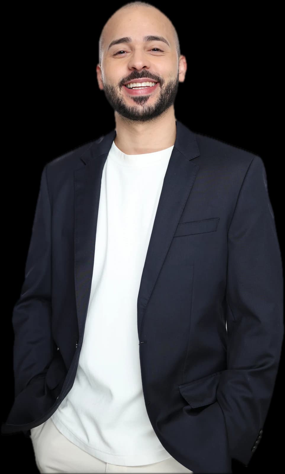 Gabriel Ostolaza smiling, in a navy blazer and a white t-shirt